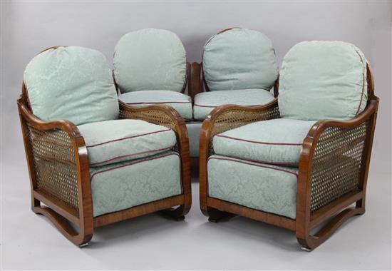 A 1930s walnut three piece bergere suite,